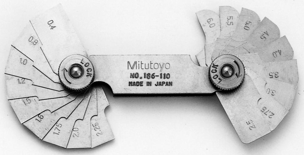 Picture of Mitutoyo 186-110 0.4-6mm, Concave/Convex Radius Gage Set, 18 Pairs Of Leaves (0.4, 0.8, 1, 1.2, 1.6mm, 1.75 To 3mm By 0.25mm, 3.5 To 6mm By 0.5mm), Locking Clamp
